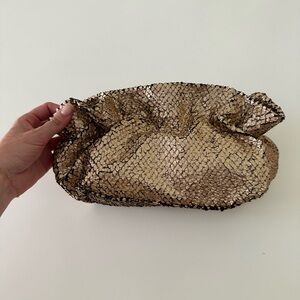 Rose gold anthropology clutch. With gold chain.